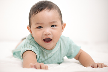 Smiling asian baby